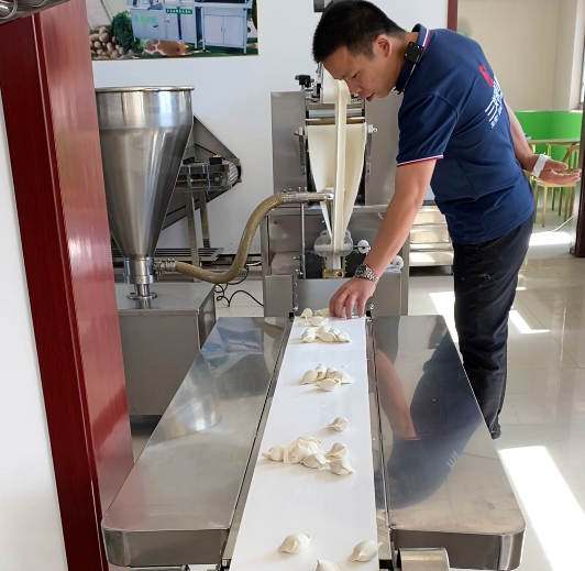 想做速凍餃子加工廠，應(yīng)該選用什么樣的餃子機？